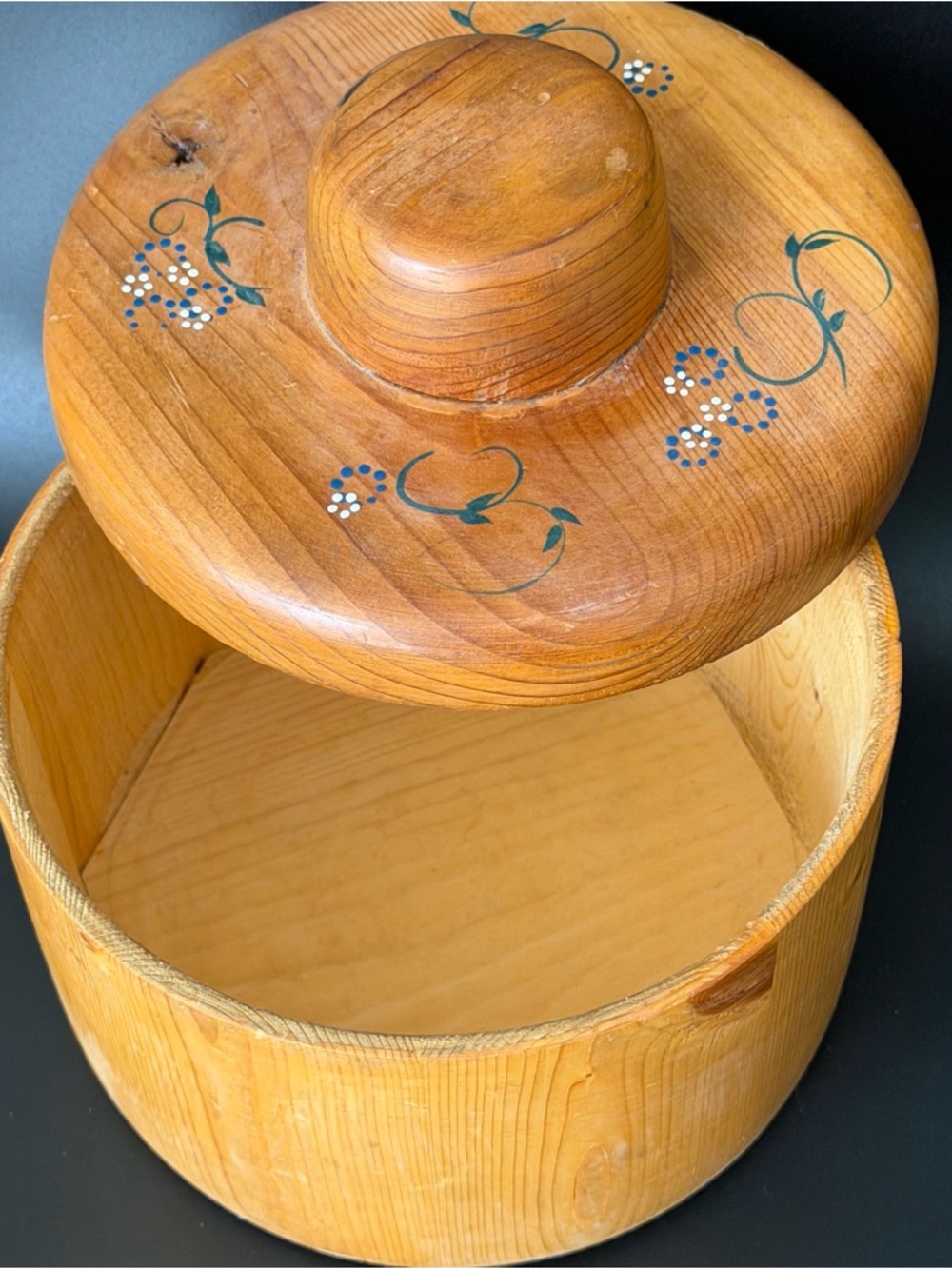 handcrafted wooden storage box with a lidded design
